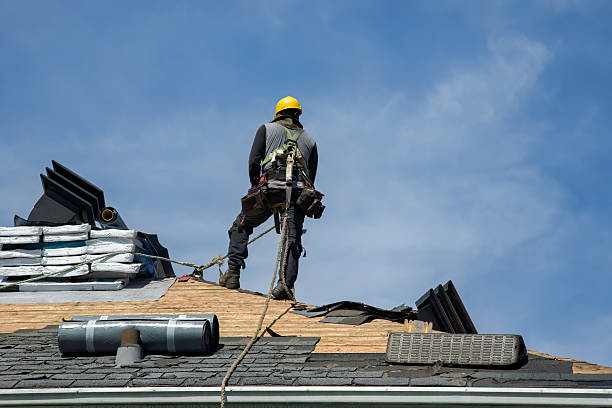 Professional Gutter Installation technician working in Rimforest, CA